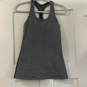 Lululemon black and white stripe tank size 6. Great condition.
